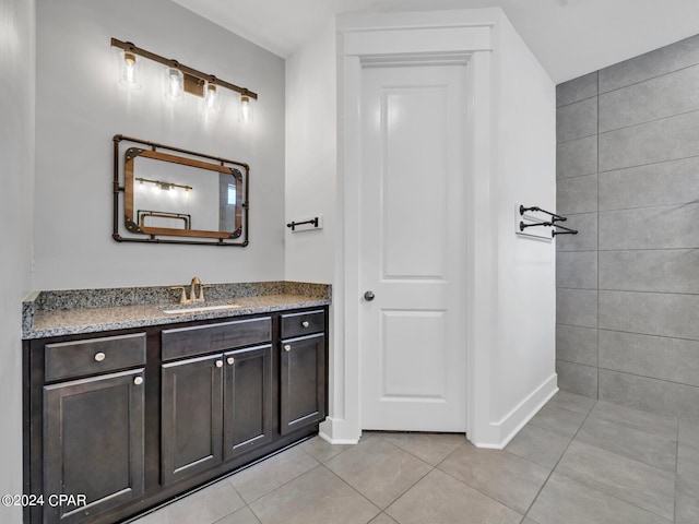 bathroom with vanity and tile patterned floors