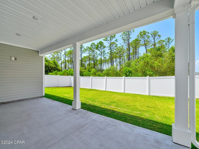 garage featuring a garage door opener and electric panel