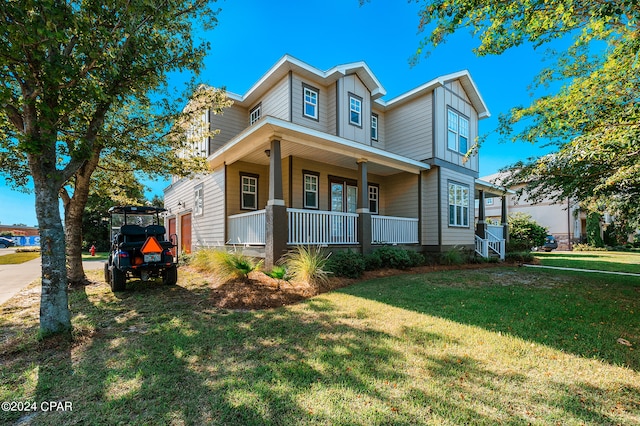 view of front facade featuring a porch and a front yard