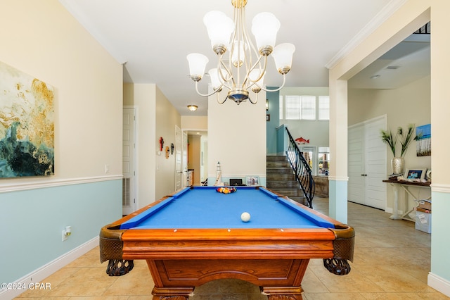 recreation room with light tile patterned floors, crown molding, and a notable chandelier