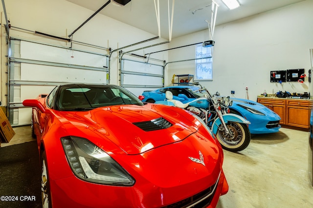 garage featuring a garage door opener