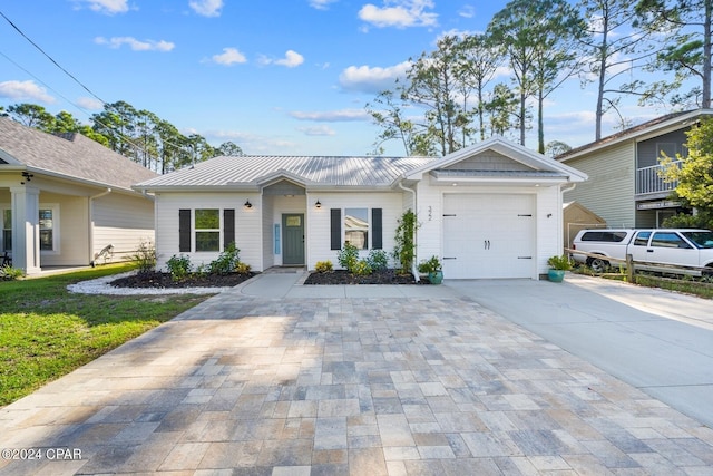 single story home with a garage