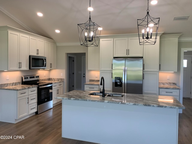 kitchen with appliances with stainless steel finishes, sink, a notable chandelier, and pendant lighting