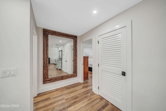 hall featuring light hardwood / wood-style flooring