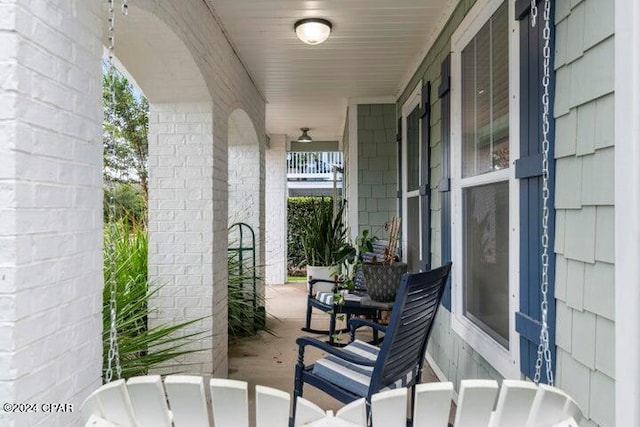 balcony featuring covered porch