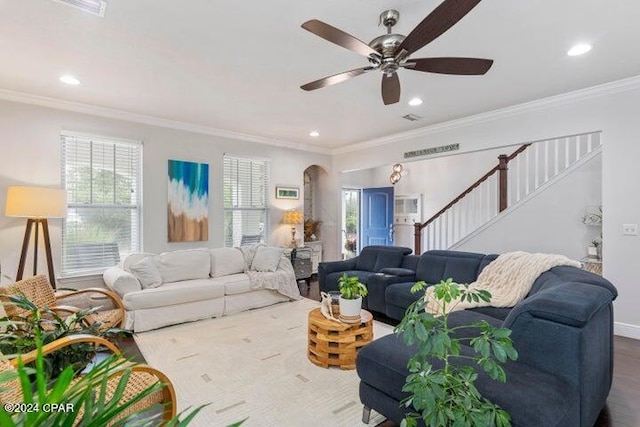 living room with stairway, recessed lighting, ceiling fan, and ornamental molding