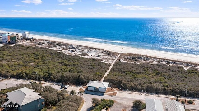 bird's eye view featuring a beach view and a water view