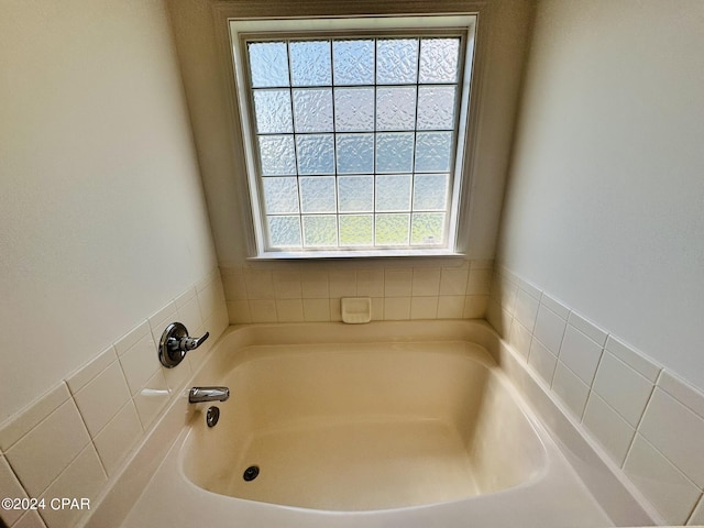 bathroom featuring a bath