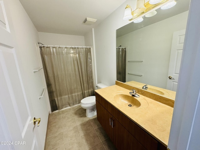 full bath featuring curtained shower, tile patterned flooring, toilet, visible vents, and vanity