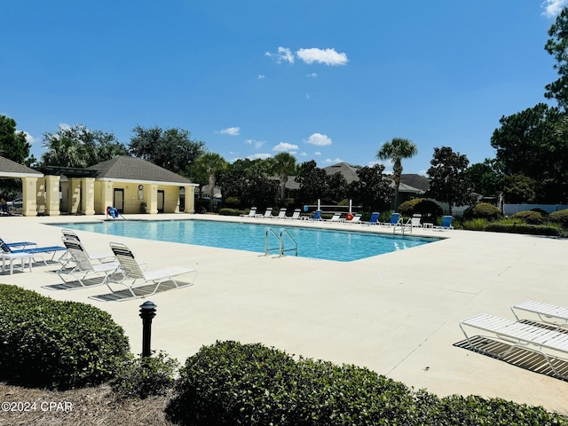 pool with a patio area