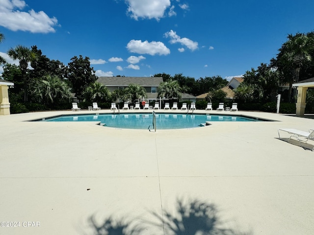 community pool featuring a patio