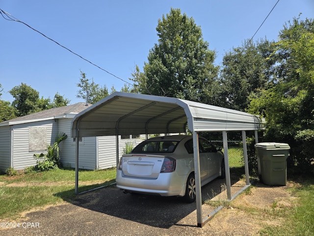 view of parking / parking lot with a carport