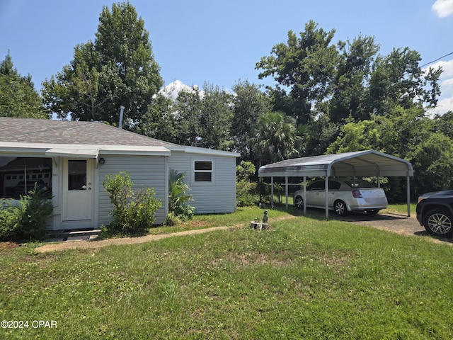 exterior space with a carport