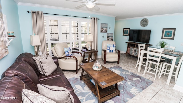 living room featuring ceiling fan, light tile patterned floors, and ornamental molding