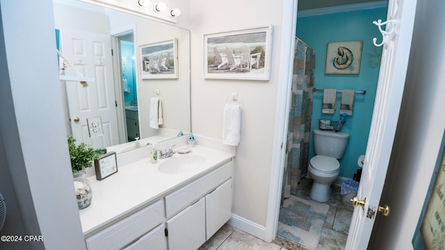 bathroom with curtained shower, tile patterned flooring, toilet, vanity, and ornamental molding