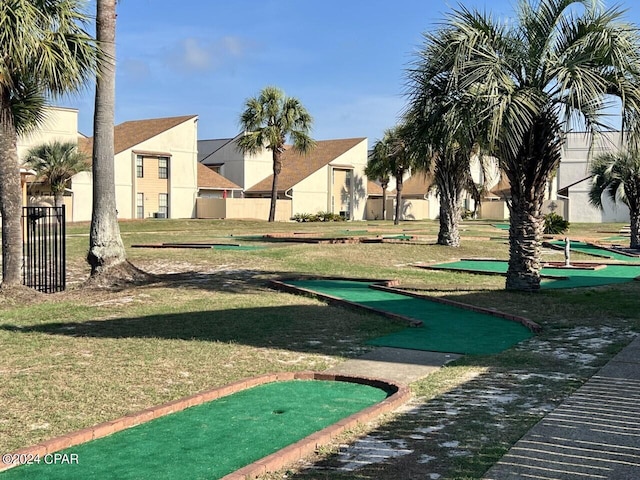 view of home's community featuring a lawn