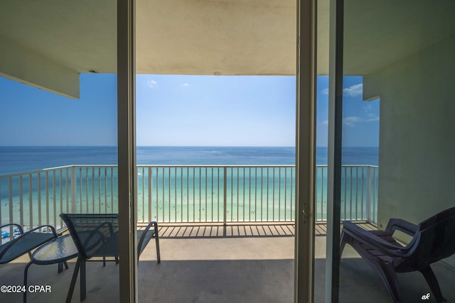 balcony featuring a water view