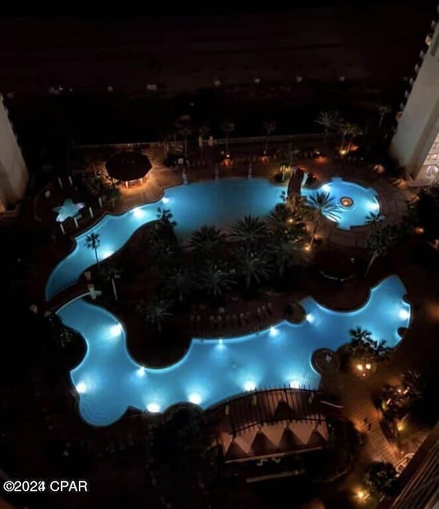 view of swimming pool with a fenced in pool