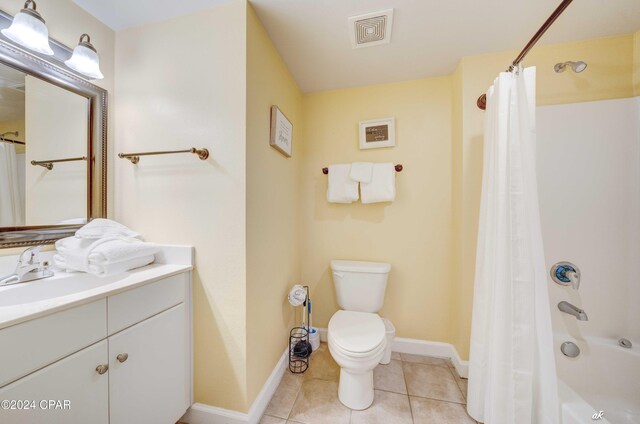 full bathroom with vanity, tile patterned flooring, toilet, and shower / bath combo