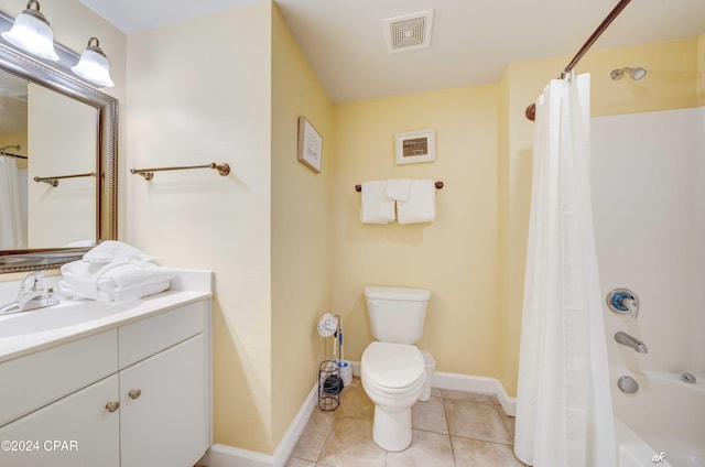 full bathroom featuring visible vents, baseboards, toilet, vanity, and tile patterned flooring