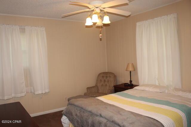 bedroom featuring ceiling fan