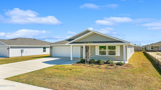 view of front of property featuring a front yard and a garage