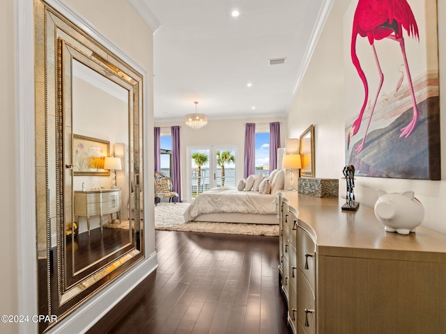 bedroom with dark wood-style floors, recessed lighting, visible vents, and crown molding