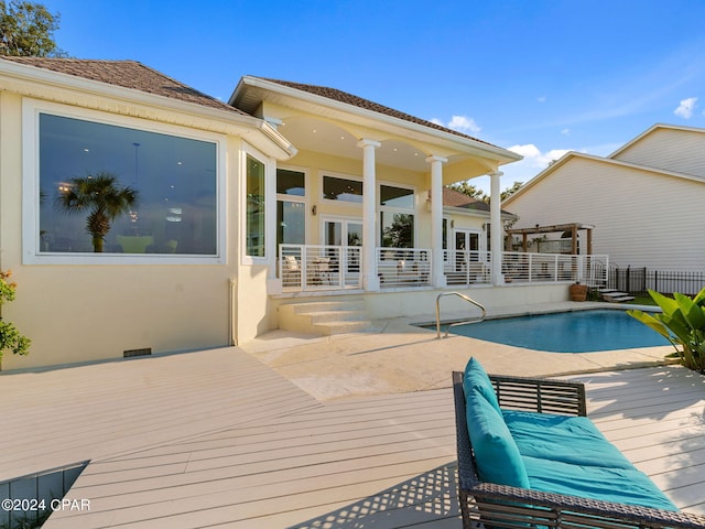 view of pool featuring a wooden deck