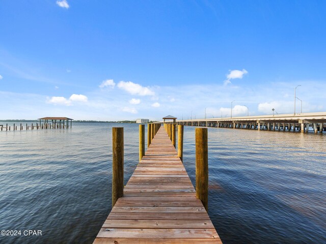 view of dock with a water view