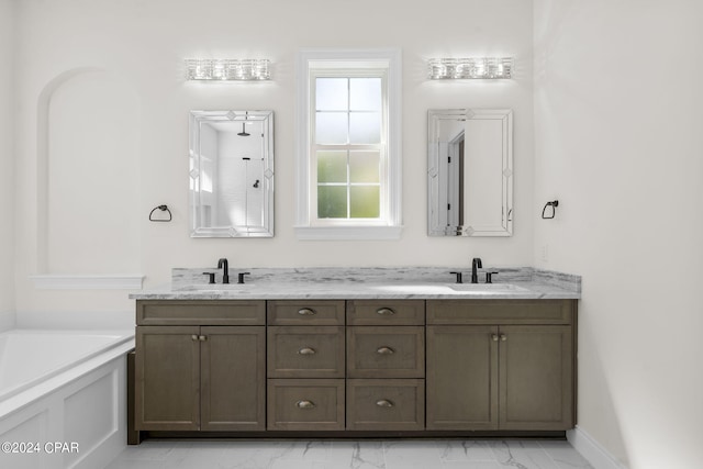 bathroom with vanity and a bathtub