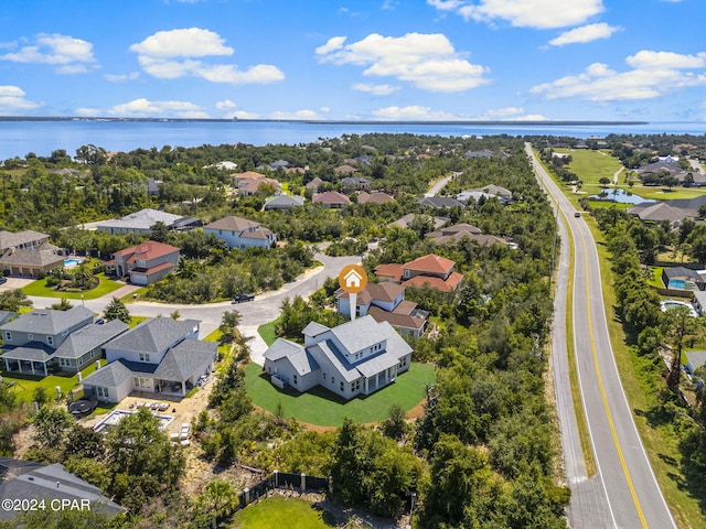 bird's eye view with a water view