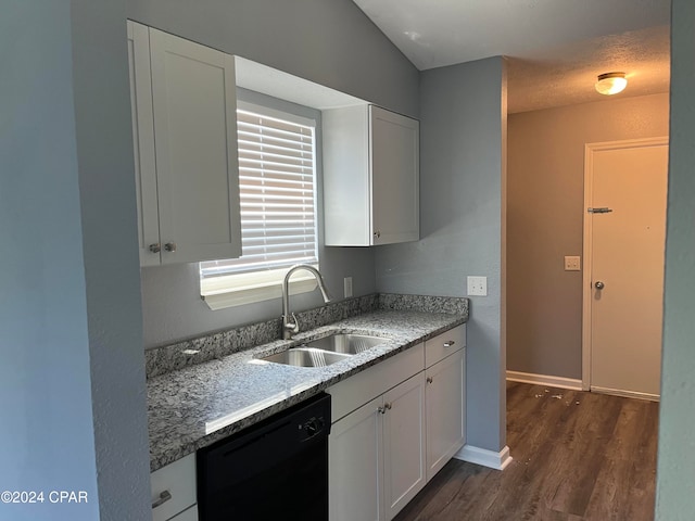 kitchen with sink, white cabinets, black dishwasher, and dark wood-type flooring