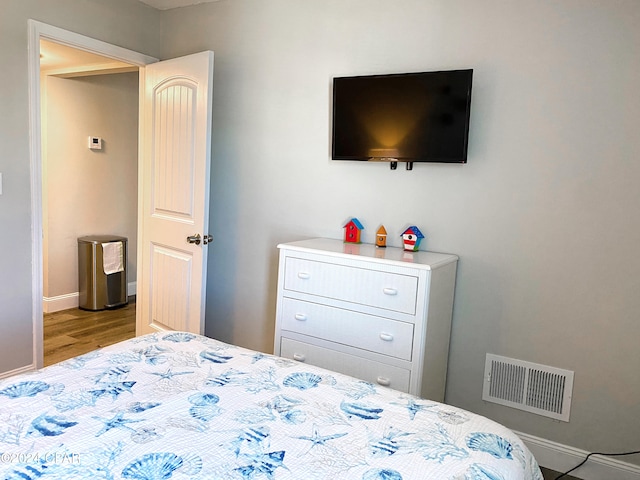 bedroom with light hardwood / wood-style floors