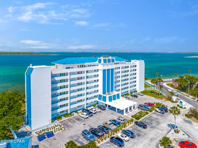 birds eye view of property featuring a water view