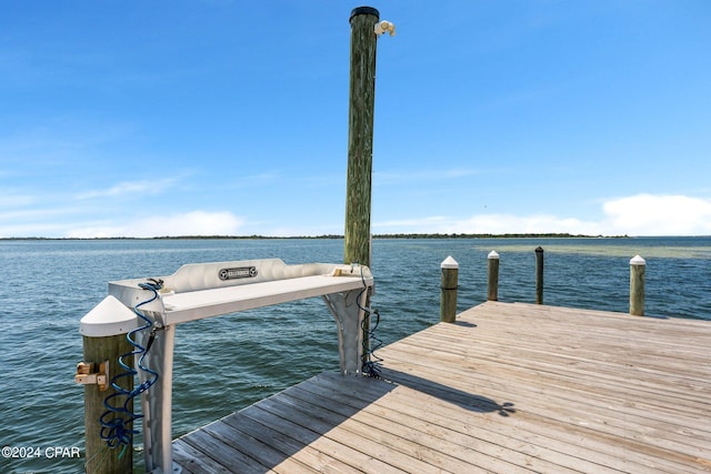 view of dock with a water view