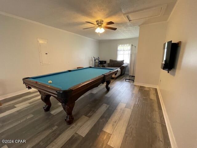 rec room featuring dark wood-type flooring, a textured ceiling, ceiling fan, pool table, and electric panel