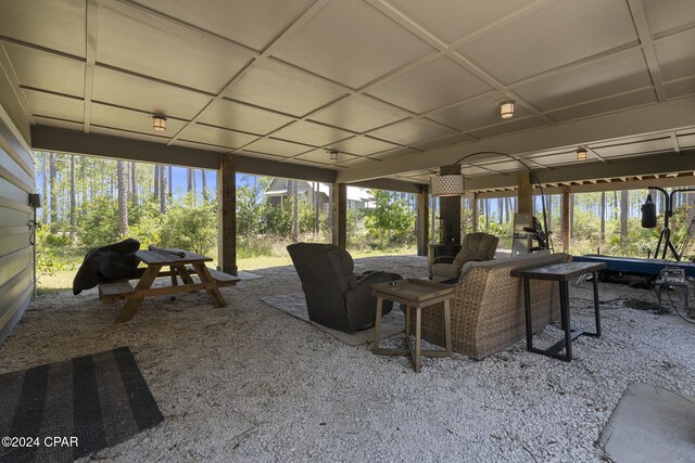 exterior space featuring coffered ceiling