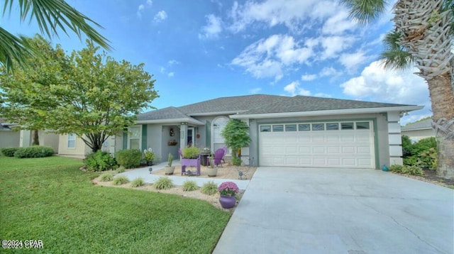 ranch-style home with a front lawn and a garage