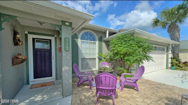 property entrance featuring a garage