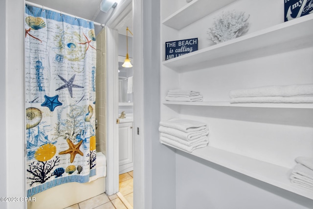 bathroom with tile patterned floors