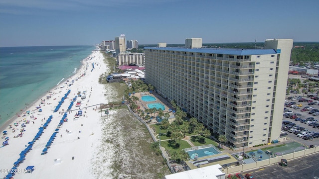 aerial view featuring a water view and a beach view