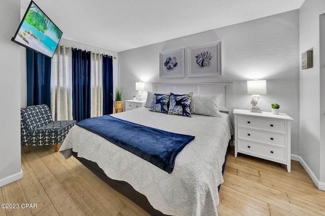 bedroom featuring light hardwood / wood-style flooring