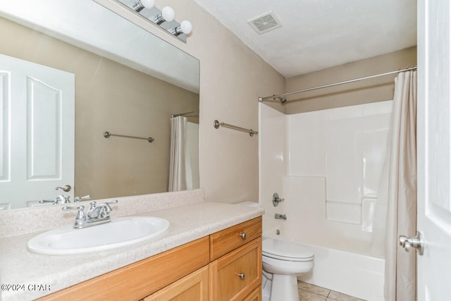 full bathroom featuring vanity, toilet, shower / tub combo with curtain, and tile patterned floors