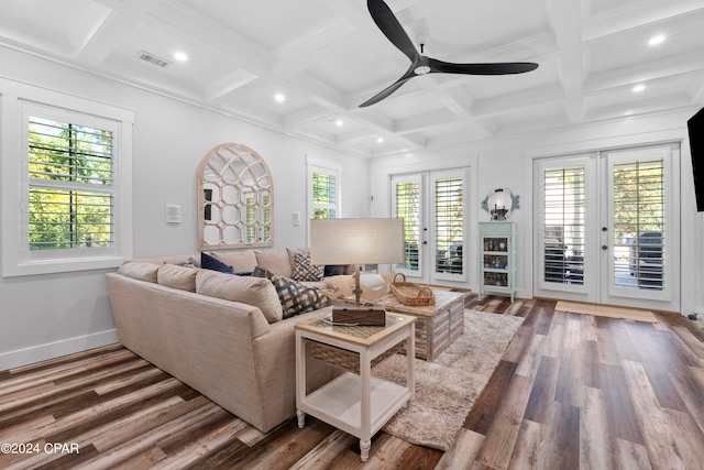 living room with hardwood / wood-style floors, ceiling fan, beamed ceiling, and french doors