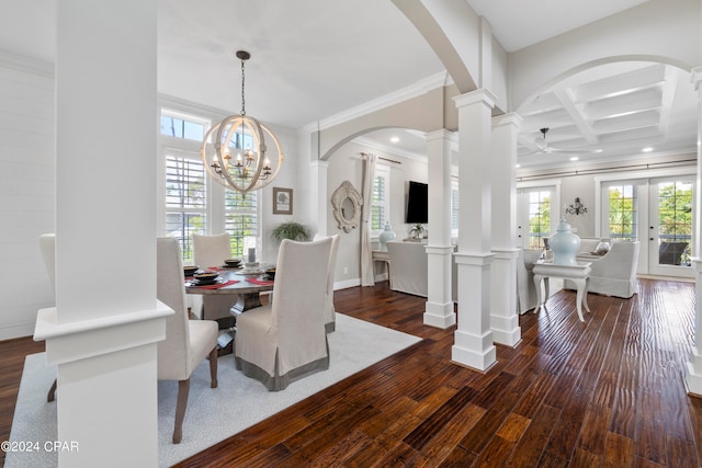 dining space with coffered ceiling, dark hardwood / wood-style flooring, beamed ceiling, crown molding, and decorative columns