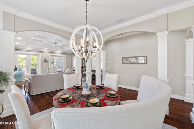 dining room with ornamental molding, coffered ceiling, dark hardwood / wood-style floors, and french doors