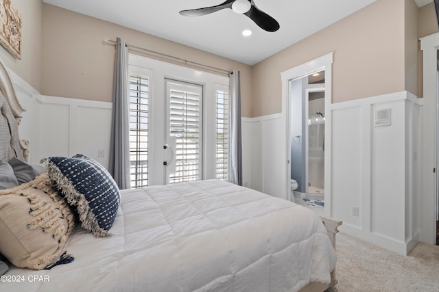 bedroom featuring carpet flooring, ceiling fan, ensuite bathroom, and access to exterior