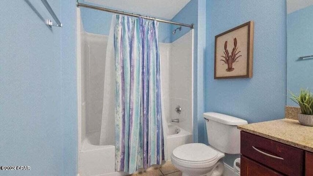 full bathroom with shower / bath combination with curtain, vanity, toilet, and tile patterned flooring