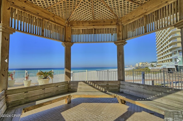 view of patio featuring a water view