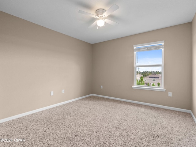 carpeted empty room with ceiling fan